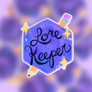 May include: Purple and blue iridescent sticker with a pencil and stars. The sticker says "Lore Keeper" in black cursive writing.
