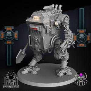 May include: A gray, mechanical war machine model with a boxy body, articulated limbs, and a shovel-like attachment. The model features rivets, pipes, and a skull emblem. The base is gray, and the background is dark.
