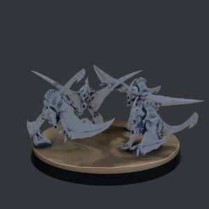 May include: A group of four gray fantasy creature figurines with large wings and sharp blades, posed on a circular, tan-colored base. The creatures have detailed armor and menacing expressions, suggesting a battle scene.