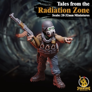May include: A painted miniature figure of a person wearing a gas mask and holding a rifle. The figure is wearing a brown jacket and pants, and has a green gas mask with a black strap. The figure is standing on a gray background. The text "Tales from the Radiation Zone" and "Scale: 28-32mm Miniatures" is visible in the image.