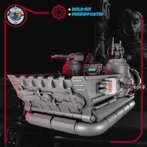 May include: A gray, futuristic vehicle with multiple turrets and detailed mechanical components. The design includes a series of tubes and a central structure with a figure on top. The image also includes the text "BUILD-KIT" and "PRESUPPORTED".