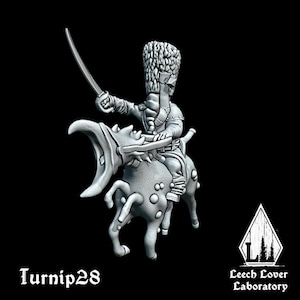 May include: A gray miniature figure of a soldier riding a creature with large horns and a sword. The figure is wearing a tall hat and uniform. The text "Turnip28" is at the bottom left, and "Leech Lover Laboratory" is at the bottom right.