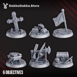 May include: A collection of six gray miniature game objectives, including a cross, flag, treasure chest, weapons rack, and a table with a book. The text "6 OBJECTIVES" is at the bottom, and the DakkaDakka.Store logo is at the top.