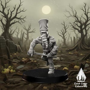May include: A gray miniature figure of a soldier with a tall hat and a sword, set against a desolate, war-torn landscape with leafless trees and a full moon. The figure is on a black base. The text "Leech Lover Laboratory" is visible.