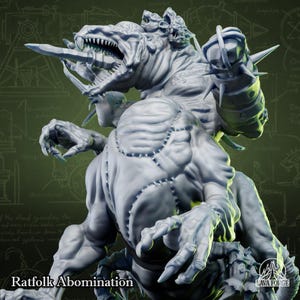 May include: A light gray miniature figure of a multi-headed creature with sharp teeth, a sword held in its mouth, and a spiked gauntlet on one arm. The creature has visible stitched seams across its torso and multiple limbs. Text reads Ratfolk Abomination.