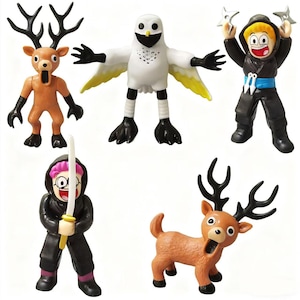 May include: A collection of five cartoon figurines. The figurines include a deer, a ninja, and a bird-like creature. The deer figurines are brown with black antlers. The ninja figurines are wearing black outfits. The bird-like creature is white with yellow accents.