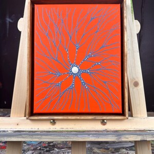 May include: A framed painting of a stylized, branching, neuron-like structure in shades of gray on a bright orange background.