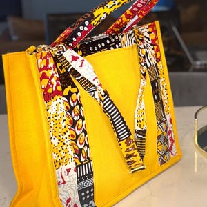 DiWaki Africa Inspired Yellow colorful Tote bag, beautiful African Fabric.  Zipper close top, fabric hand handle. 10% OFF and FREE Shipping.