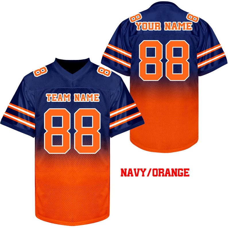 May include: Navy blue and orange sublimated football jersey with white numbers and stripes. The jersey has "TEAM NAME" and "88" on the front and "YOUR NAME" and "88" on the back.