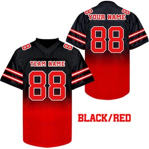 May include: Black and red football jersey with white trim. The jersey has a gradient design and the number 88 on the front. The text "TEAM NAME" is above the number and the text "YOUR NAME" is above the number on the back of the jersey.