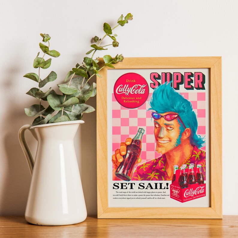 May include: A framed vintage-style advertisement for "Cully Cola." The poster features a cartoon man with blue hair and sunglasses holding a bottle of cola. The background is pink and white checkered. The text "SUPER" and "SET SAIL!" are visible.