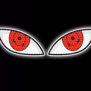 Puede incluir: Dos ojos rojos estilizados sobre un fondo negro. Los iris presentan un diseño en espiral dentro de un patrón rojo y negro. Los ojos están delineados en blanco con una textura de panal.