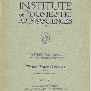 May include: A vintage, light green booklet titled "Woman's Institute of Domestic Arts & Sciences, Inc." with the text "Instruction Paper with Examination Questions" and "Tissue-Paper Patterns Part 1 by Mary Brooks Picken".