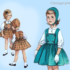 May include: A vintage illustration of two girls wearing matching dresses and hats. The dresses are a brown and white floral print with a green bib and the hats are green with white polka dots. One girl is wearing white gloves and a white blouse.