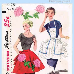 May include: Vintage sewing pattern featuring illustrations of women's clothing. The pattern includes a red skirt with rose appliques, a black top, and a white apron with blue polka dots and trim. The text on the pattern reads "Pattern" and "One Size".