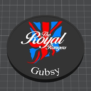 May include: A black and white round sticker with a red, white, and blue Union Jack design. The text "The Royal Rangers" and "Gubsy" are printed on the sticker.