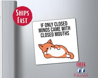 May include: A white square magnet with the text "IF ONLY CLOSED MINDS CAME WITH CLOSED MOUTHS" and a cartoon cat illustration. The cat is orange and white, lying down with a bored expression. The magnet is on a silver surface.