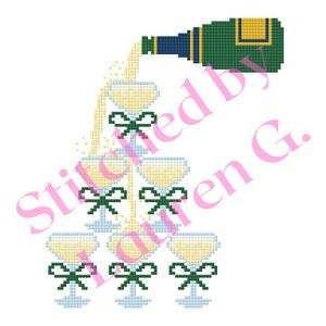 May include: A cross-stitch design of a champagne tower with a bottle pouring champagne into the glasses. The glasses are decorated with green bows. The bottle is green and blue.