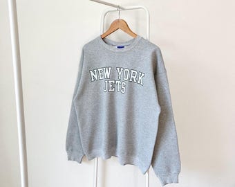 Moletom cinza vintage Champion dos anos 2000/ Nova York/ Jets/ NFL/ futebol americano/ tamanho G
