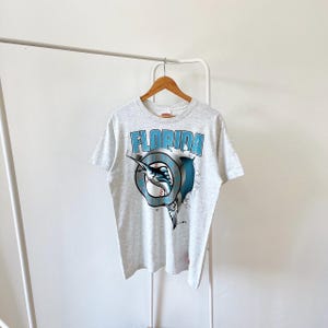 Vintage 90s/ Florida/ Marlins/ MLB/ baseball/ Nutmeg mills/ made in USA/ gray/ t-shirt (L)