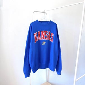 ヴィンテージ 00年代/カンザス/ジェイホークス/NCAA/ヴィンテージ J アメリカ スポーツウェア 刺繍 ブルー スウェットシャツ/2XL