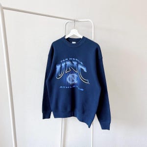 Vintage 90s/ North Carolina/ Tar Heels/ UNC/ Made in USA/ vintage Salem blue sweatshirt/ L