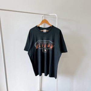 Vintage/ 90s/ Philadelphia/ Flyers/ hockey/ vintage Pro player/ made in USA/ black/ t-shirt (XL)