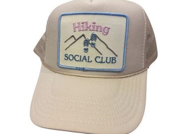 hiking social club trucker hat. hike, explore. a little spin on my best selling hat the “apres ski social club” hat but for hiking!!