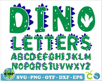 Può includere: Lettere dell'alfabeto di dinosauro verdi con punte blu. Le lettere compongono "Dino Letters" e includono l'intero alfabeto.