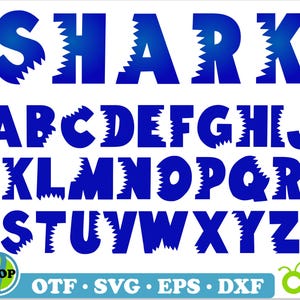 May include: A blue alphabet with a jagged, shark tooth-like design. The letters are uppercase and the word "SHARK" is displayed at the top.