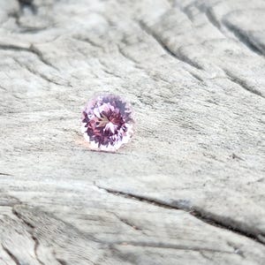 Mahenge Malaya Garnet: 0.83 Carat Peach Pink Round Gemstone
