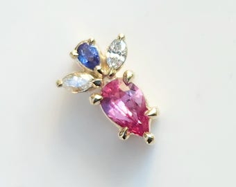 Roze saffier, diamant en blauwe spinel schuifhanger in 14 kt geelgoud
