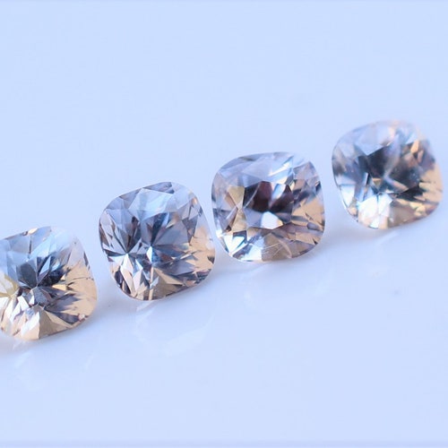 Burmese Silver spinel 4mm, .42 carats each Cushion cut gems, shops sold by the piece but can be matched as pairs, great for earrings, or rings