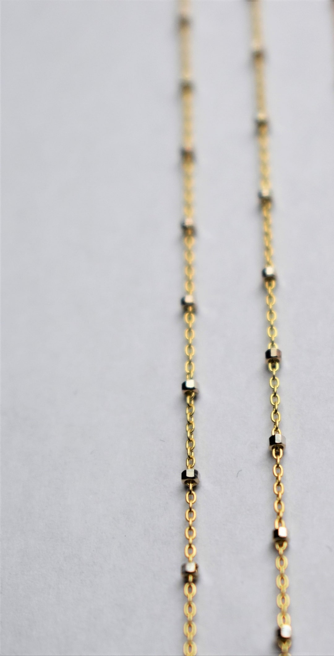 White and yellow gold mixed chain discount