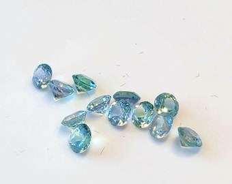RESERVED Listing for MH, 14 kt white gold floral studs with kornerupine