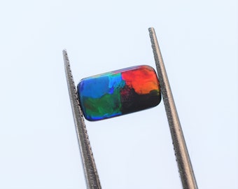 Australian Black Opal, Red Blue Broad Flash Bright Opal, .78 Carats Quality Natural Opal Rectangle 9.36 x 5.23 x 2.06mm, October Birthstone