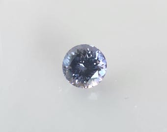 Unheated Tanzanite Gemstone: .97 Carat Round, Natural Tri-Chroic