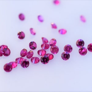 Loose Pink Burma Ruby Rounds: 1.7mm Heated Gemstone (Sold Per Piece)