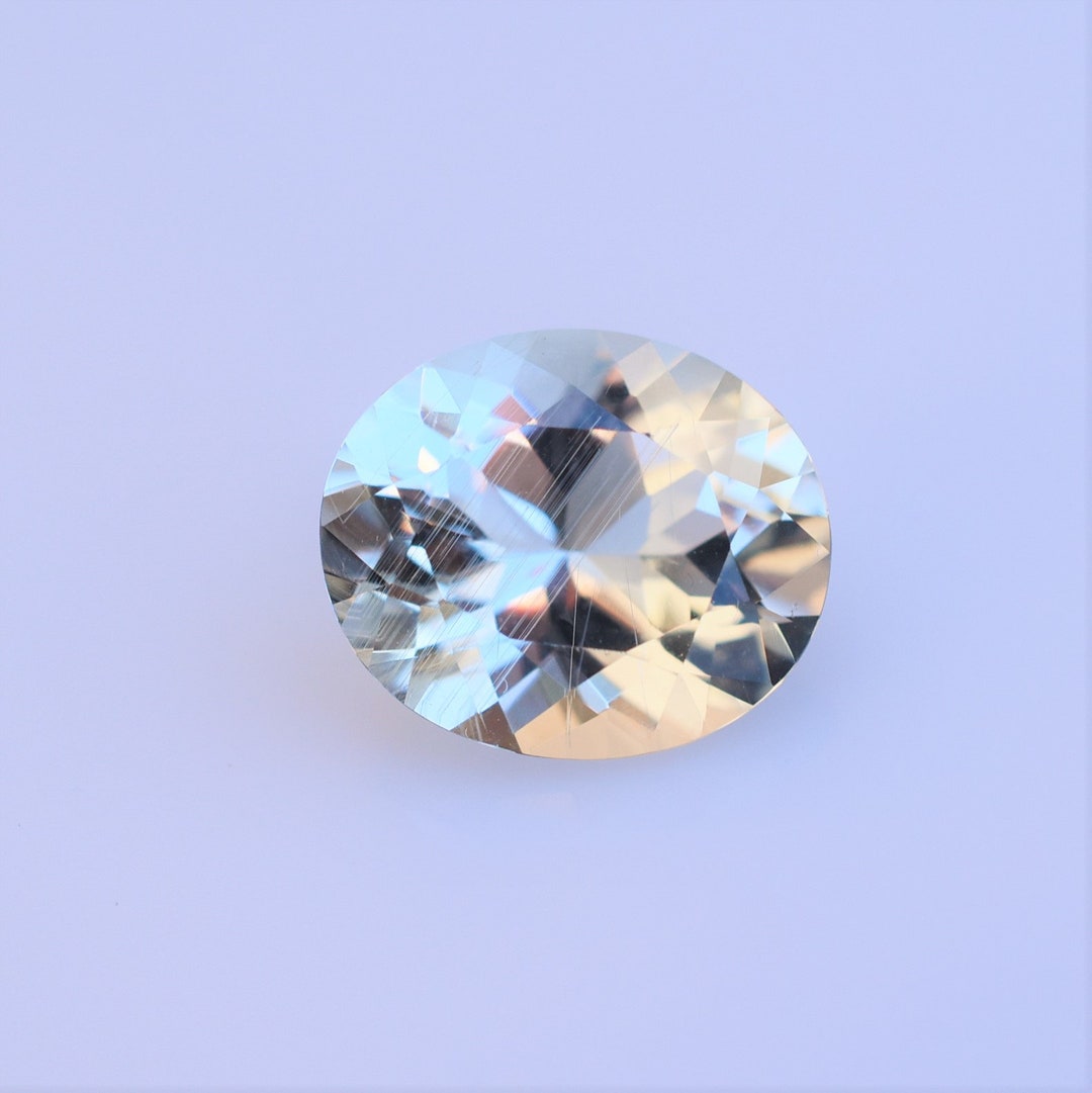 Six Carat Oval Goshenite Gemstone: Madagascar Origin, 13x11mm