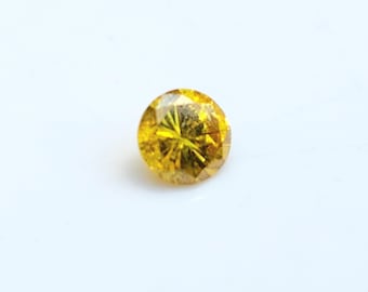 Untreated Golden Yellow Diamond: Round Brilliant Cut, 0.22 Carat