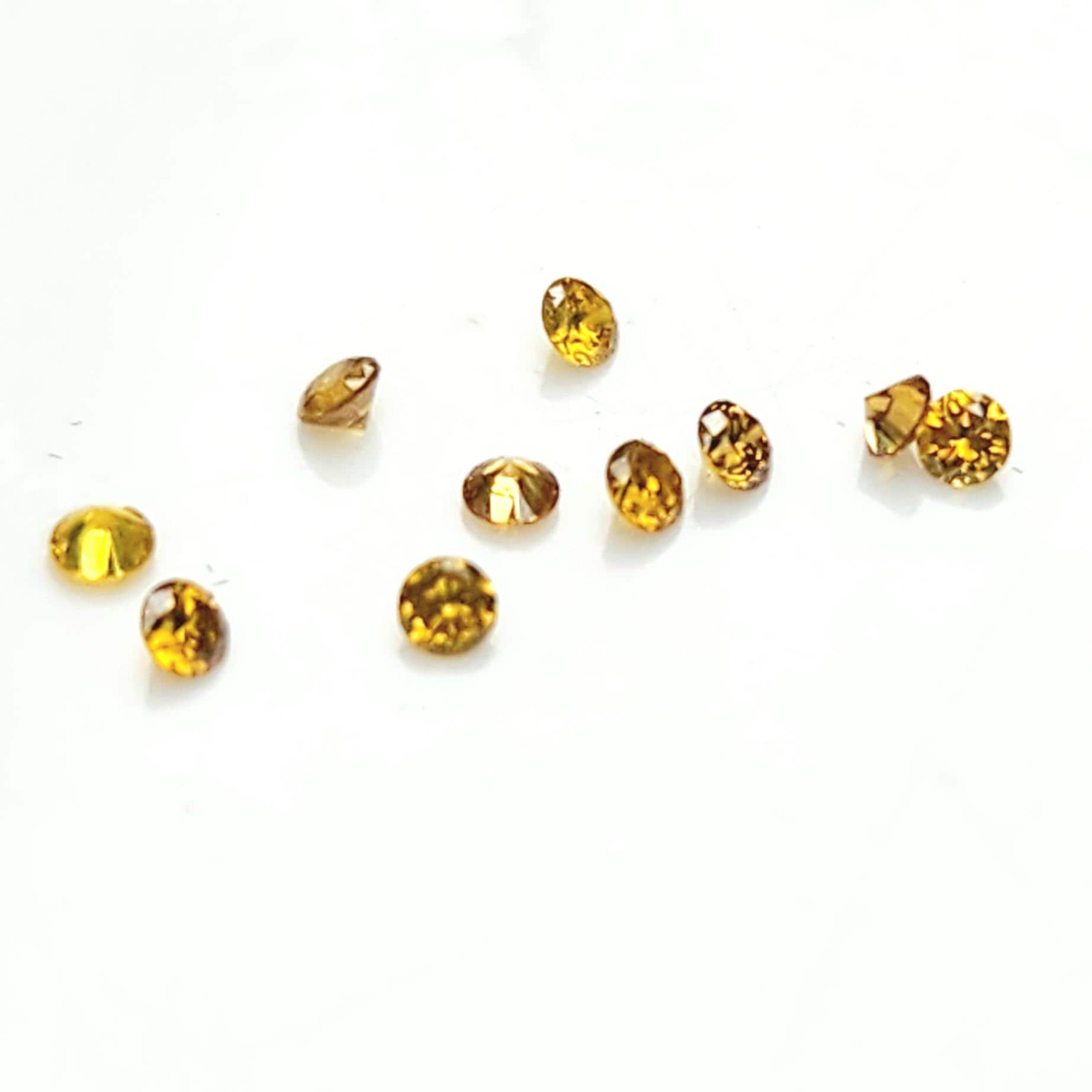 Golden Yellow Round Diamond: 1.4mm Untreated Gemstone (Sold Per Piece)