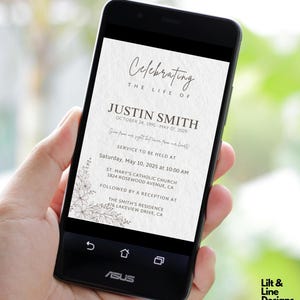 May include: A smartphone displays a memorial announcement. The text reads "Celebrating the Life of Justin Smith" with dates and service details. Floral accents frame the text. The phone is black with an ASUS logo.
