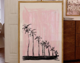 May include: A rectangular wall art print in a light wood frame featuring a series of black palm tree silhouettes against a soft, textured pastel pink background. The trees decrease in height from left to right, set against a solid black base.
