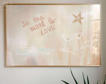May include: A rectangular wall art print in a gold frame featuring a soft beige and cream background with the text In the mood for LOVE written in a cursive script, accompanied by a hand-drawn star and two martini glasses in a light outline.