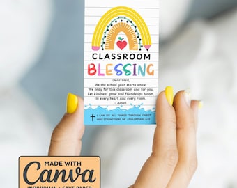 May include: A rectangular card with a rainbow design and the words "CLASSROOM BLESSING". The card includes a prayer and the text "I CAN DO ALL THINGS THROUGH CHRIST WHO STRENGTHENS ME - PHILLIPPIANS 4:13". The card is made with Canva.