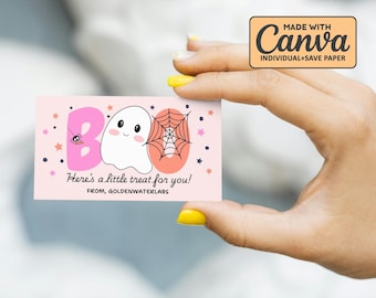 May include: A pink Halloween-themed card with the word "BOO" in pink and orange, featuring a cute ghost and spiderweb illustration. Text reads "Here's a little treat for you!" and "FROM, GOLDENWATERLABS".