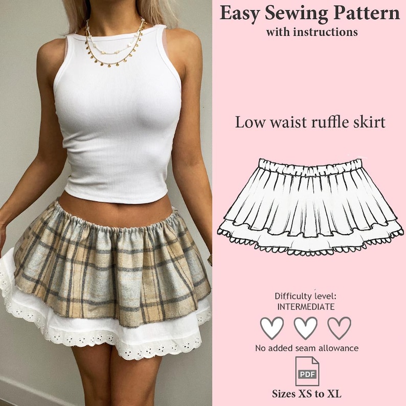 May include: A white ribbed tank top paired with a low-waist ruffle skirt. The skirt features a plaid pattern with a white lace trim. The image includes text that reads "Easy Sewing Pattern" and "Low waist ruffle skirt."