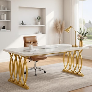May include: A modern white marble-top desk with gold-colored, oval-shaped legs. A brown leather office chair sits beneath the desk. A gold desk lamp and a vase of flowers are on the desk. The desk is in a well-lit room.