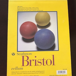 May include: A pack of Strathmore Bristol Vellum drawing paper. The paper is acid-free, heavy weight, and has a vellum surface. The pack contains 20 sheets, measures 9 by 12 inches, and weighs 100 pounds. The paper is ideal for dry media, including pencil, charcoal, and pastel.