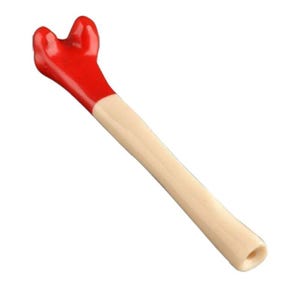 Puede incluir: Un bolígrafo novedoso con forma de hueso con la parte superior roja y un eje de color crema. El bolígrafo tiene un extremo redondeado y un agujero en la punta. El bolígrafo está diseñado para parecerse a un hueso.
